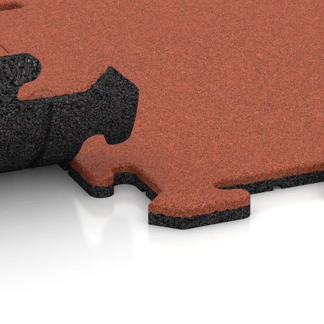 Großaufnahme vom Verbindungssystem von WARCO-Boden 6218 - Sportsplade 1,8 cm im Farbdesign Lys Rød-Orange. Abmessungen 500 x 500 x 18 mm.