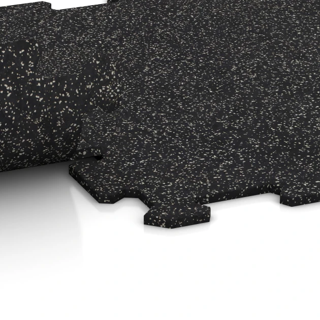 Großaufnahme vom Verbindungssystem von WARCO-Boden 0920 - Fitnessgulv Kompakt im Farbdesign Let Grå Sprøjtet. Abmessungen 485 x 485 x 8 mm | 0,235 m².