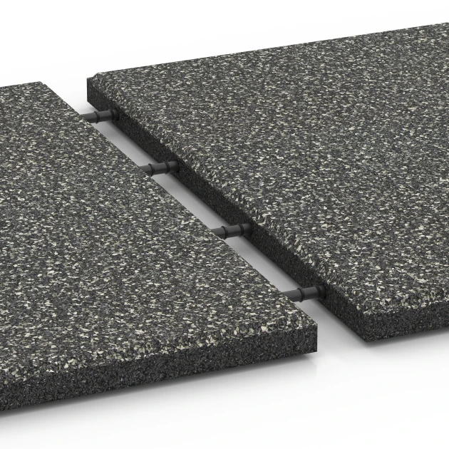 Großaufnahme vom Verbindungssystem von WARCO-Boden 6413 - Faldsikringsflise – 90 cm im Farbdesign Mørkegrå granit. Abmessungen 50 x 50 x 3 cm | 0,25 m².