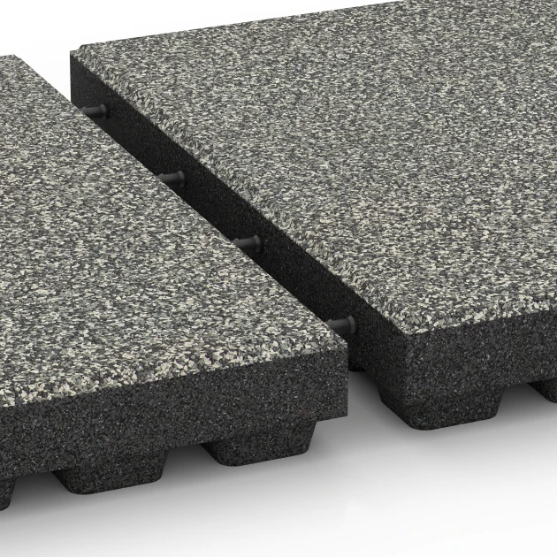 Großaufnahme vom Verbindungssystem von WARCO-Boden 6441 - Faldsikringsflise – 210 cm im Farbdesign Grå granit. Abmessungen 50 x 50 x 7 cm.