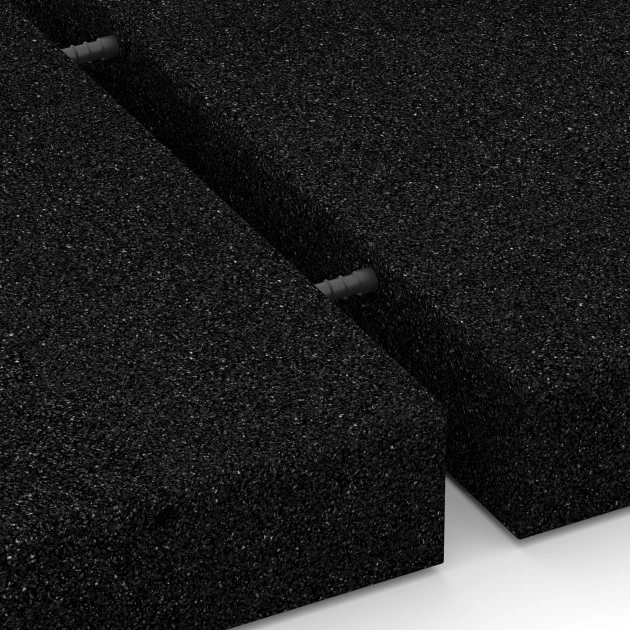 Großaufnahme vom Verbindungssystem von WARCO-Boden 6271 - Faldsikringsflise – 230 cm im Farbdesign Antracit. Abmessungen 50 x 50 x 8 cm.