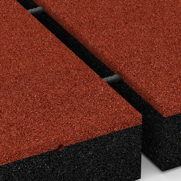 Großaufnahme vom Verbindungssystem von WARCO-Boden 6278 - Faldsikringsflise – 300 cm im Farbdesign Murstenrød. Abmessungen 50 x 50 x 11 cm.