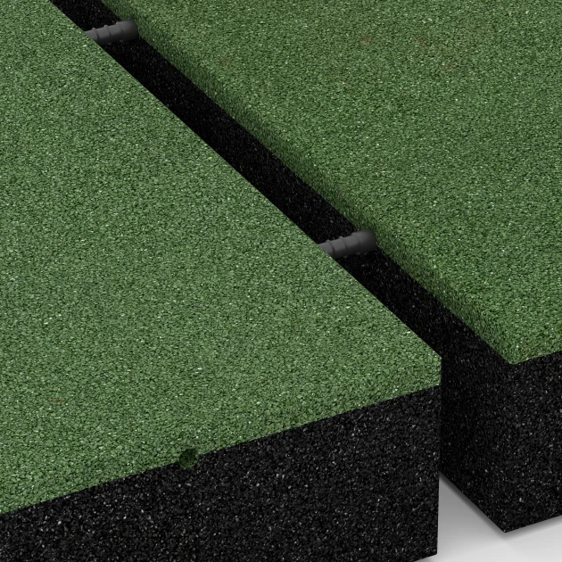 Großaufnahme vom Verbindungssystem von WARCO-Boden 6279 - Faldsikringsflise – 300 cm im Farbdesign Græsgrøn. Abmessungen 50 x 50 x 11 cm.