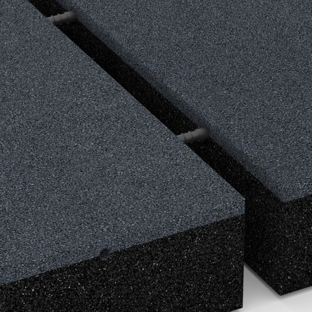 Großaufnahme vom Verbindungssystem von WARCO-Boden 6230 - Faldsikringsfliser im Farbdesign Skifergrå. Abmessungen 50 x 50 x 11 cm.