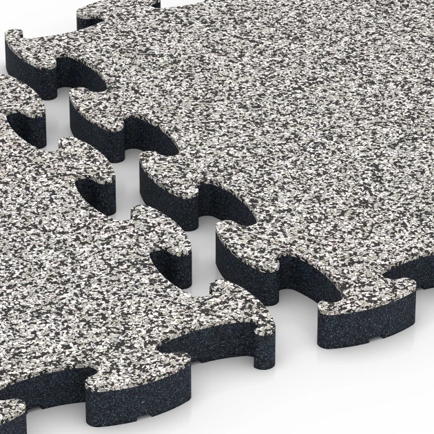 Großaufnahme vom Verbindungssystem von WARCO-Boden 6878 - Fitnessgulv Max System im Farbdesign Grå granit. Abmessungen 44,6 x 44,6 × 2,8 cm.