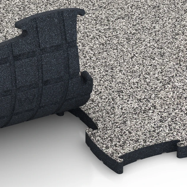 Großaufnahme vom Verbindungssystem von WARCO-Boden 6887 - Fitnessgulv Max System im Farbdesign Grå granit. Abmessungen 97,1 x 97,1 x 2,8 cm.