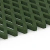 Großaufnahme vom Verbindungssystem von WARCO-Boden 7011 - Faldsikringsgræsrist im Farbdesign Græsgrøn. Abmessungen 100 x 100 x 4 cm.